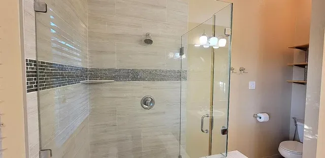 a view of an empty room with a staircase