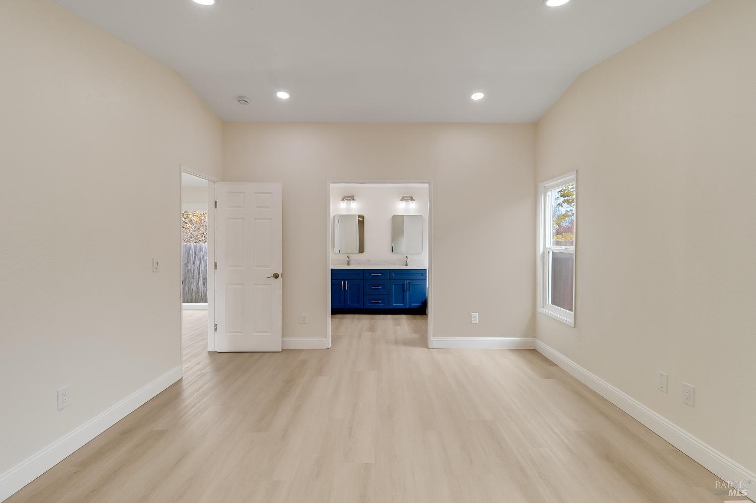 2555 Flosden Road, Unit 8 American Canyon, CA 94503 - Photo 22 of 58 a view of empty room with wooden floor