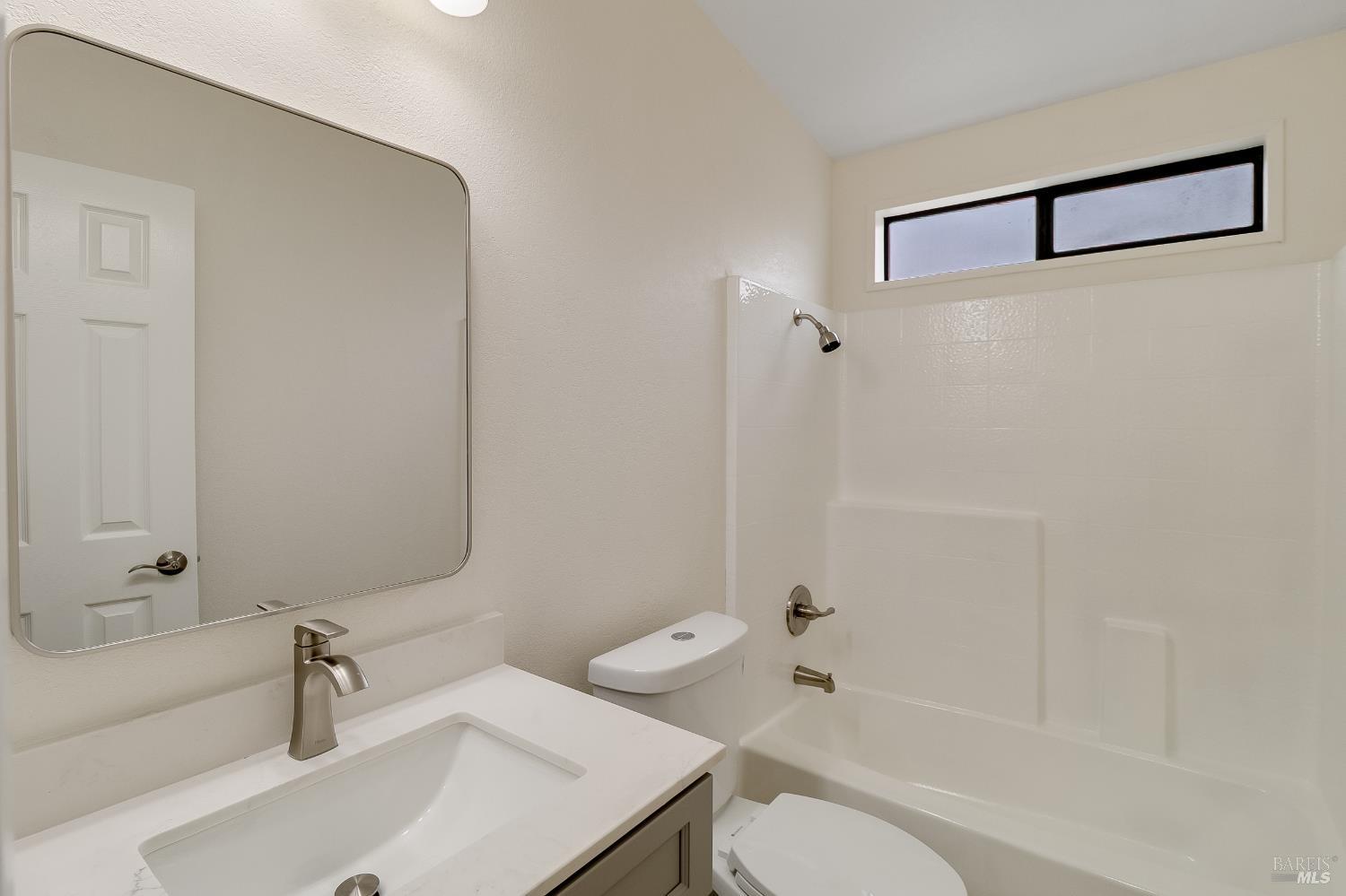 2555 Flosden Road, Unit 8 American Canyon, CA 94503 - Photo 31 of 58 a bathroom with a sink toilet and shower