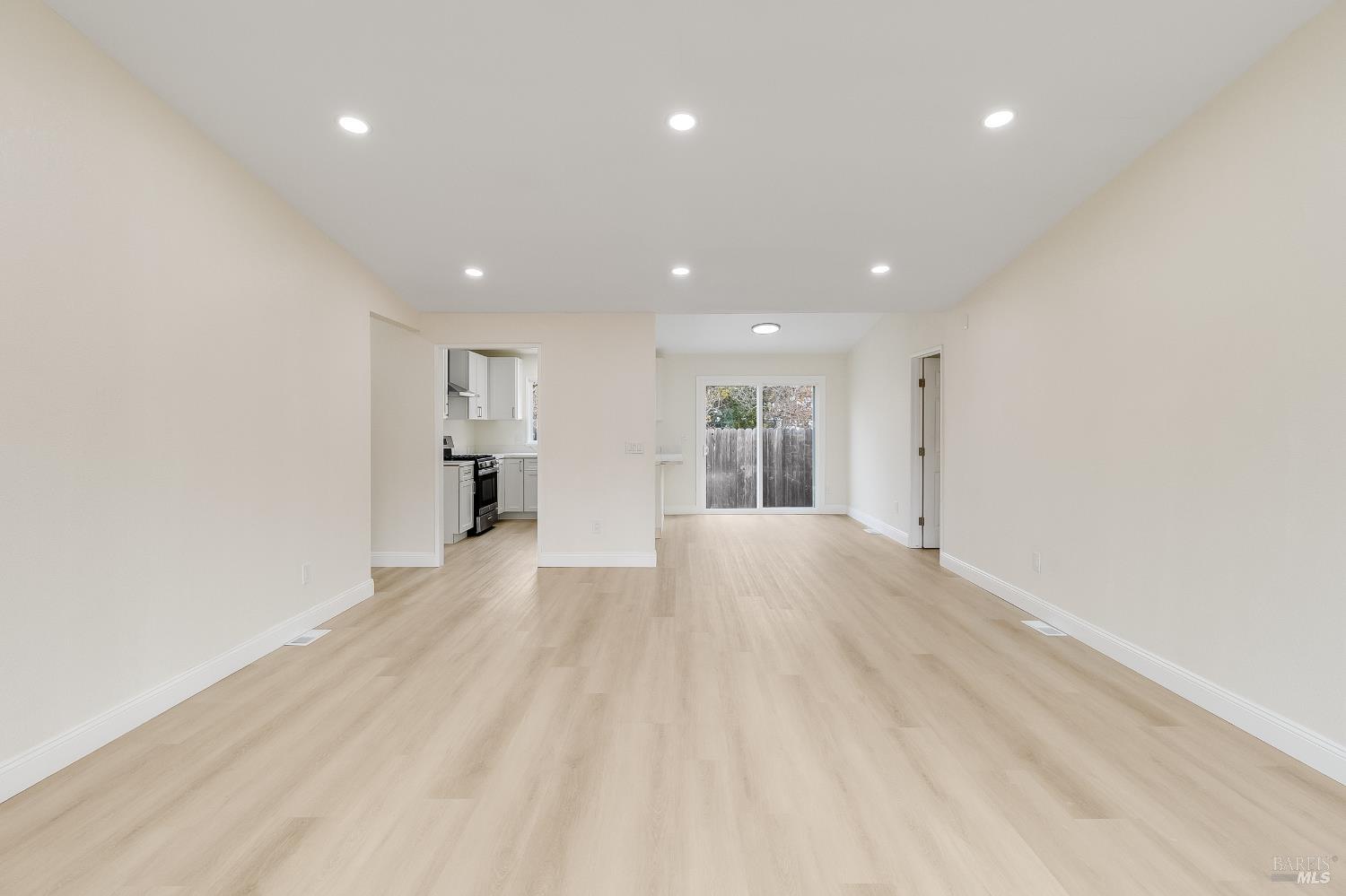 2555 Flosden Road, Unit 8 American Canyon, CA 94503 - Photo 4 of 58 a view of empty room with wooden floor