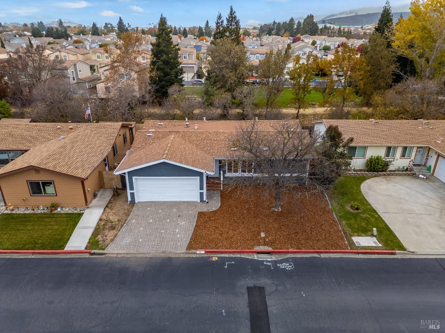 2555 Flosden Road, Unit 8 American Canyon, CA 94503 - Photo 47 of 58 an aerial view of a house with yard swimming pool and mountain view