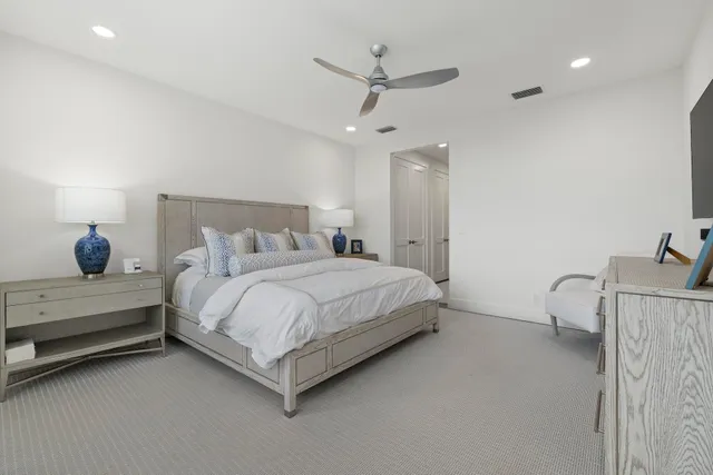a view of a kitchen with dining table and chairs