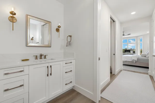 a view of a swimming pool with a garden and plants