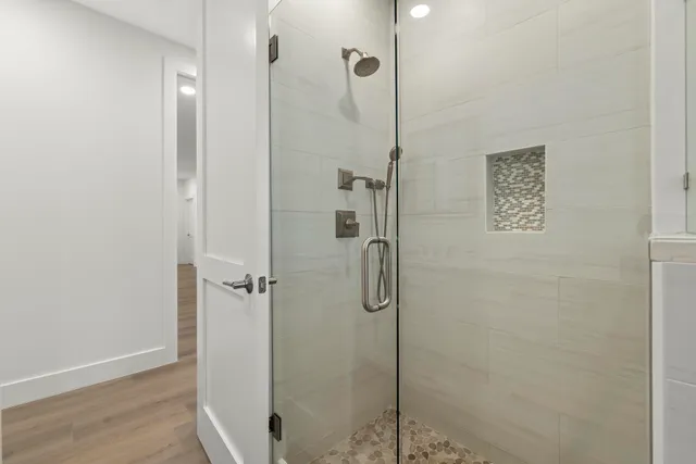 an aerial view of a house with a lake view