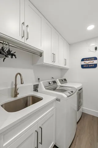 a living room with furniture and floor to ceiling window