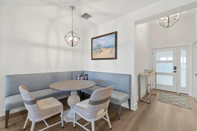 a bedroom with a bed and a ceiling fan