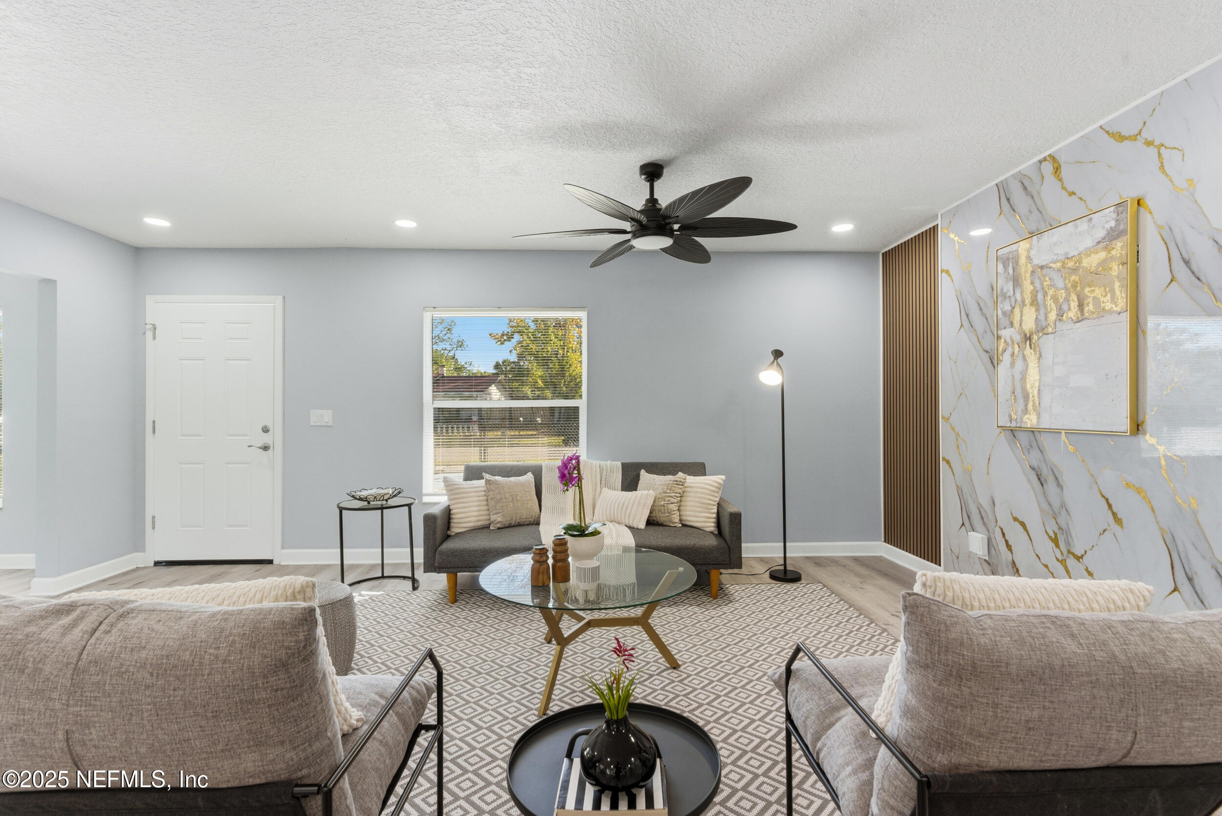 3631 North Ride Drive Jacksonville, FL 32223 - Photo 15 of 30 a living room with furniture and a large window