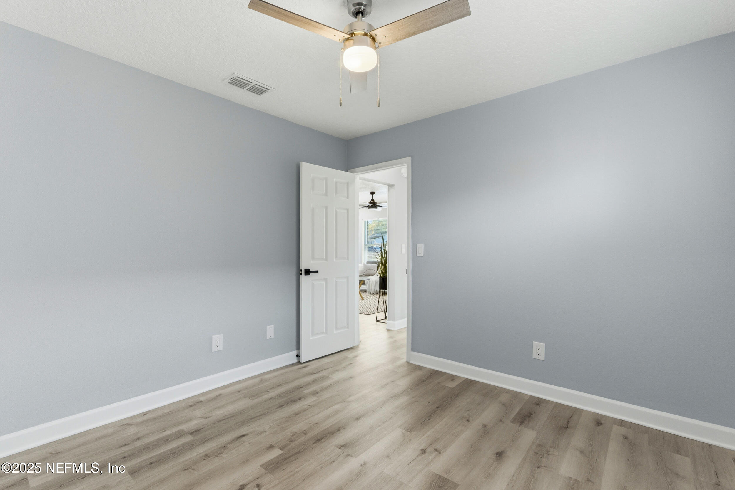 3631 North Ride Drive Jacksonville, FL 32223 - Photo 23 of 30 wooden floor in an empty room