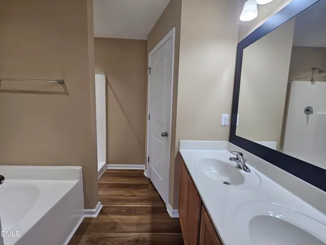 a bathroom with a white bath tub