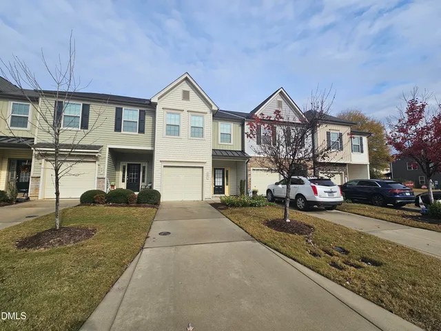 a view of a house with a street