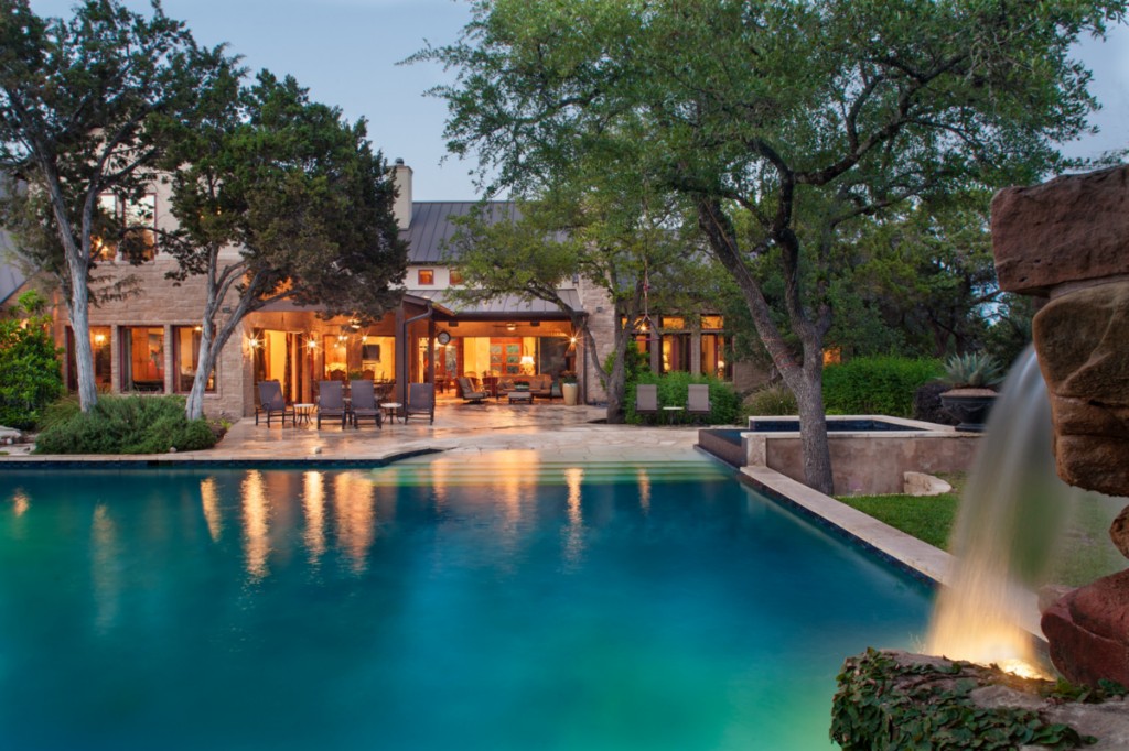 17012 Flint Rock Road Austin, TX 78738 - Photo 1 of 1 a view of swimming pool with outdoor seating and lake view