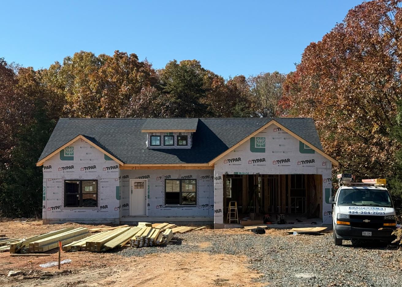 1 Kentmoor Farm Road Madison Heights, VA 24572 - Photo 2 of 38 a front view of a house with a yard