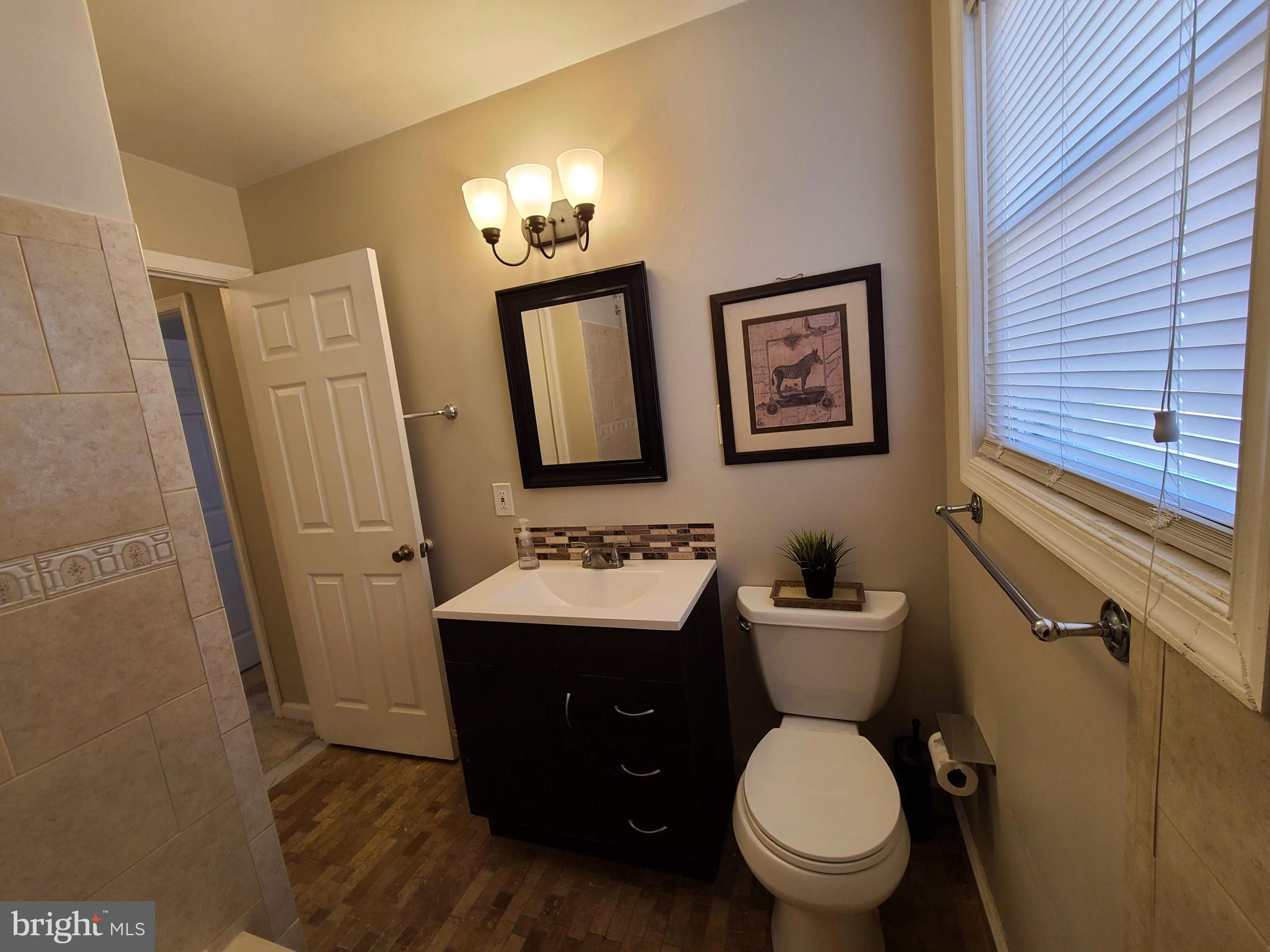 6802 Brookmill Road Baltimore, MD 21215 - Photo 22 of 36 Upstairs Bath