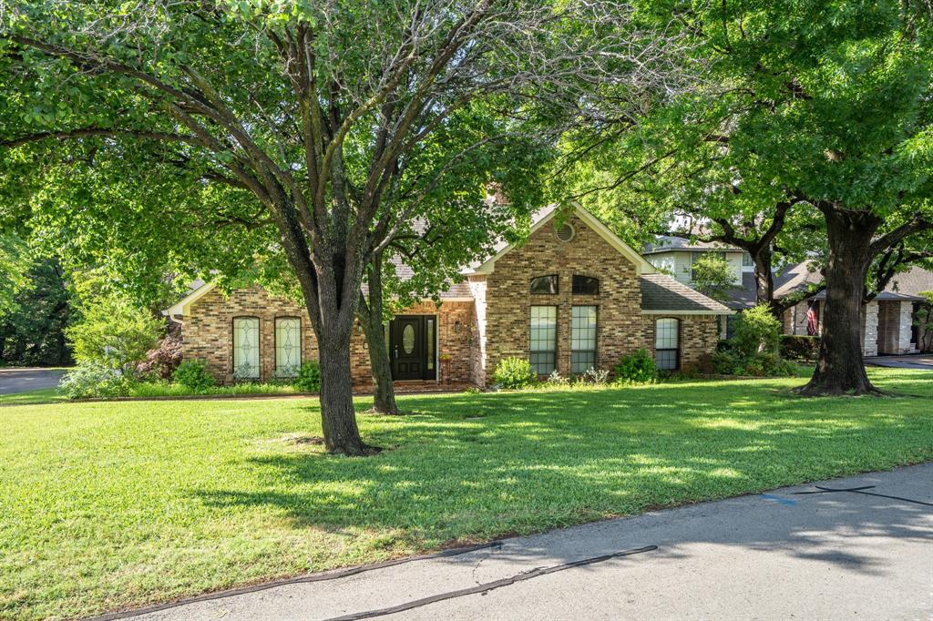 322 Whittier Street Highland Village, TX 75077 - Photo 1 of 1 a front view of a house with garden