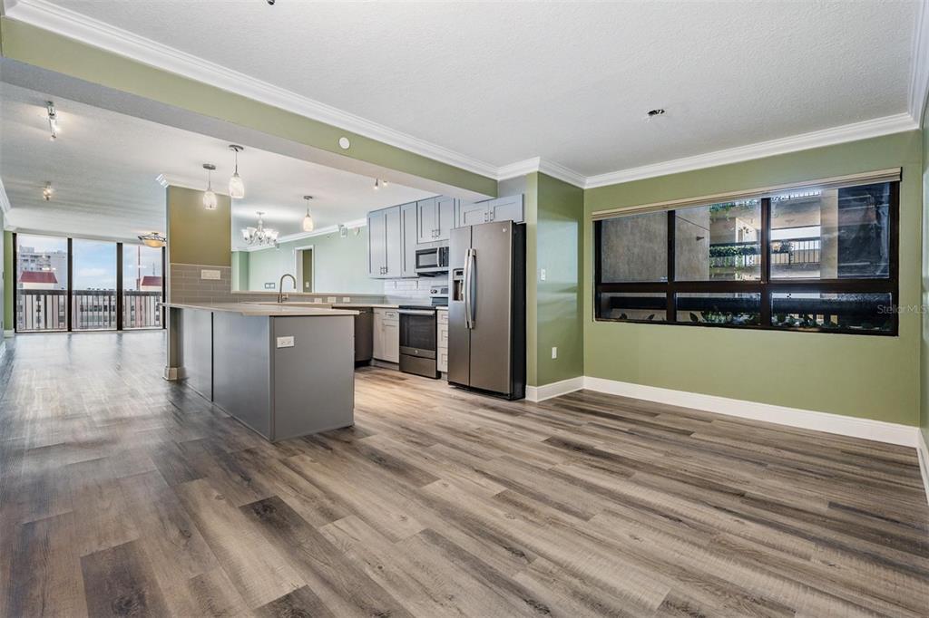 2413 Bayshore Boulevard, Unit 1004 Tampa, FL 33629 - Photo 5 of 36 a large kitchen with stainless steel appliances granite countertop a refrigerator and a stove top oven