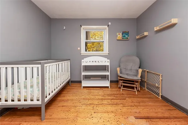 a view of room with walk in closet and bedroom