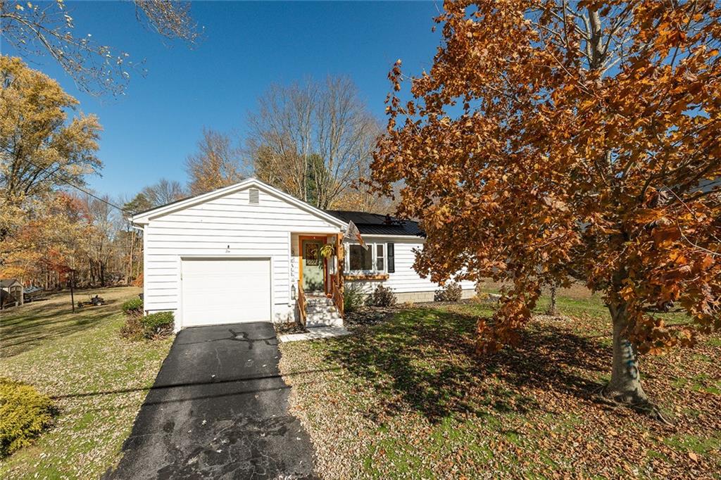 10 Fredonia Road Greenville, PA 16125 - Photo 2 of 28 a front view of a house with garden