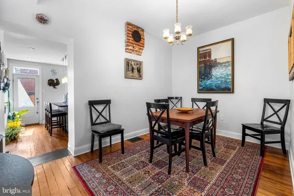 a view of a dining room with furniture