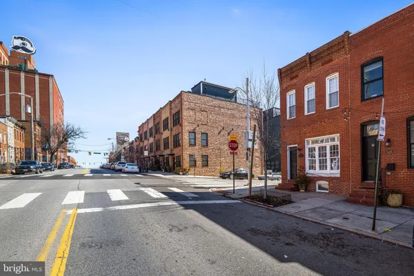 a view of a building with a street