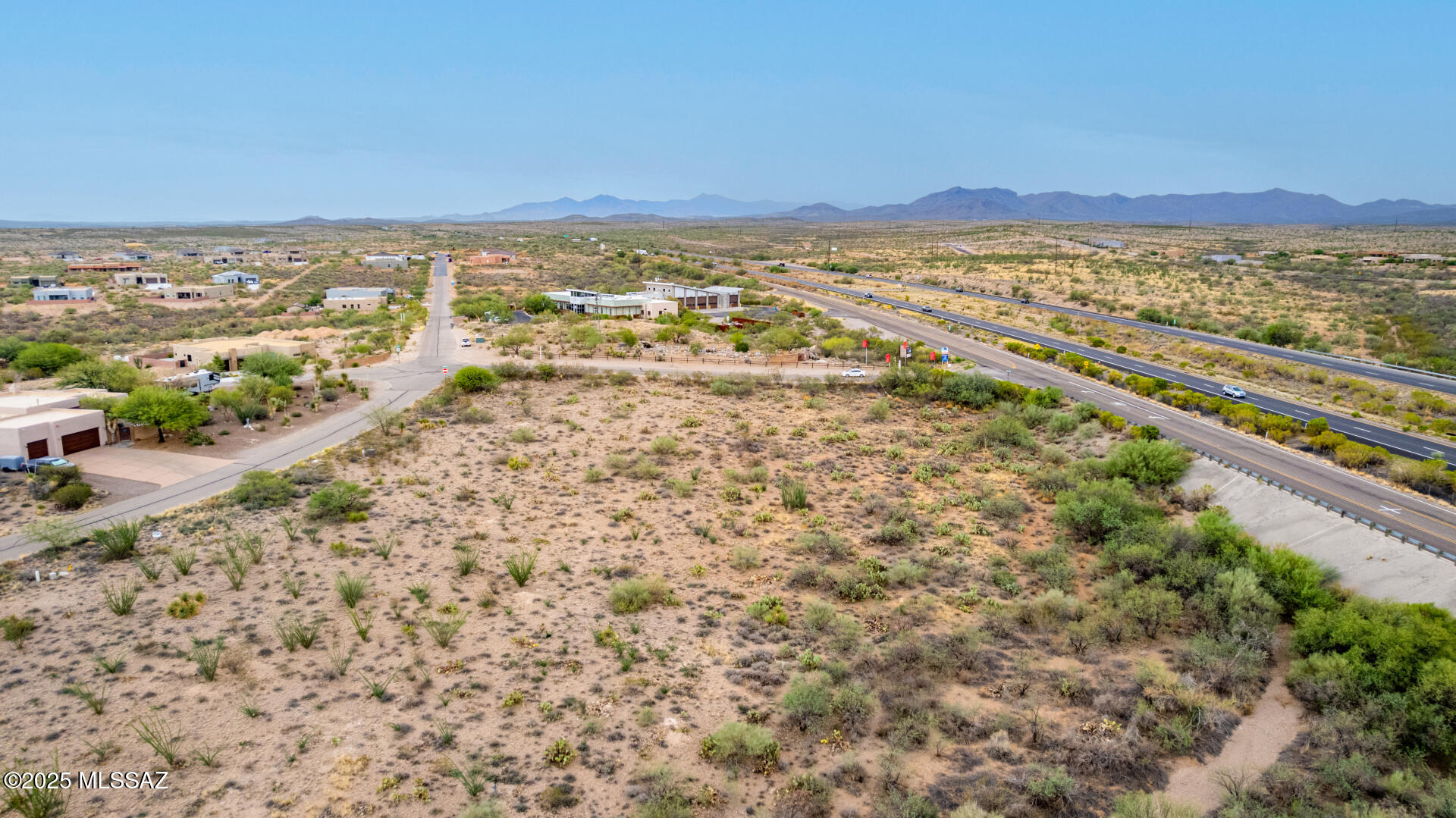 14470 East Sands Ranch Road, Unit 304 Vail, AZ 85641 - Photo 4 of 8 an aerial view of residential building and an ocean