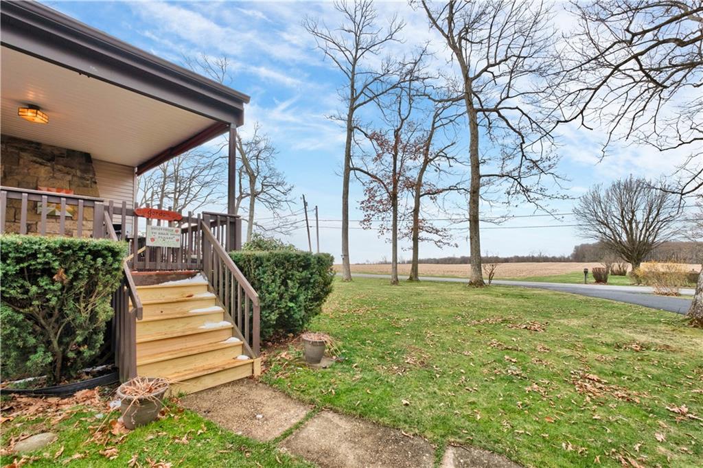 117 Weckerly Road Butler, PA 16002 - Photo 5 of 25 a view of a backyard with large trees