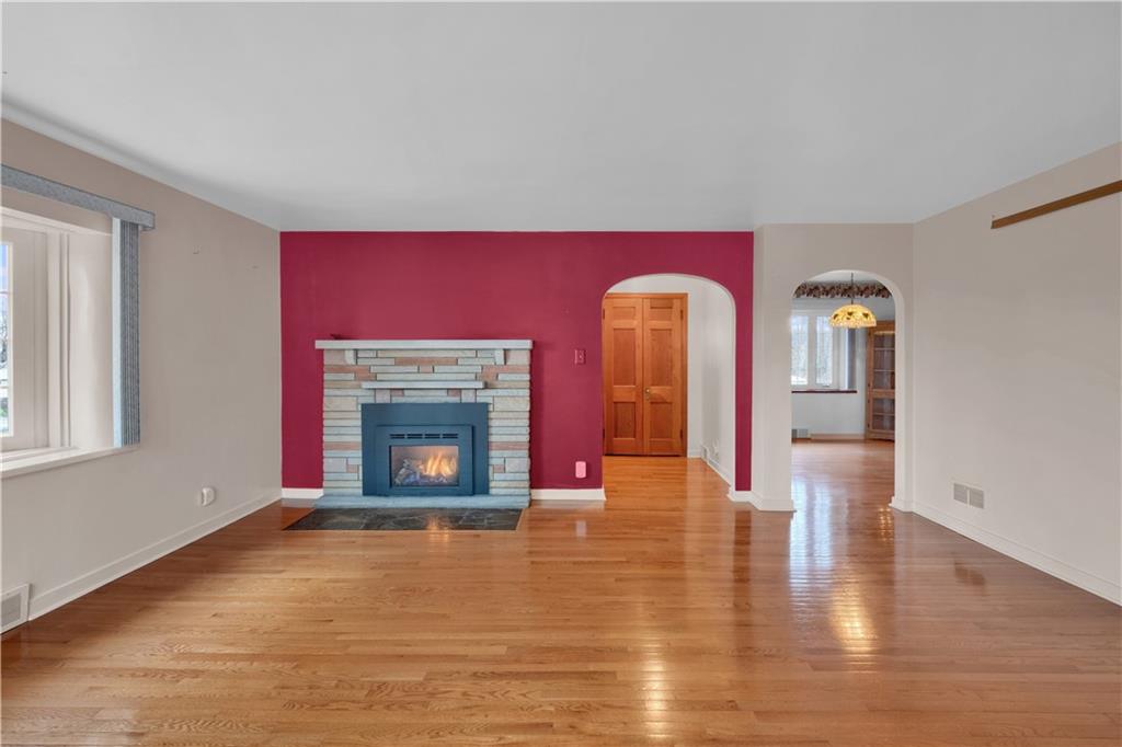 117 Weckerly Road Butler, PA 16002 - Photo 8 of 25 a view of empty room with window and fireplace