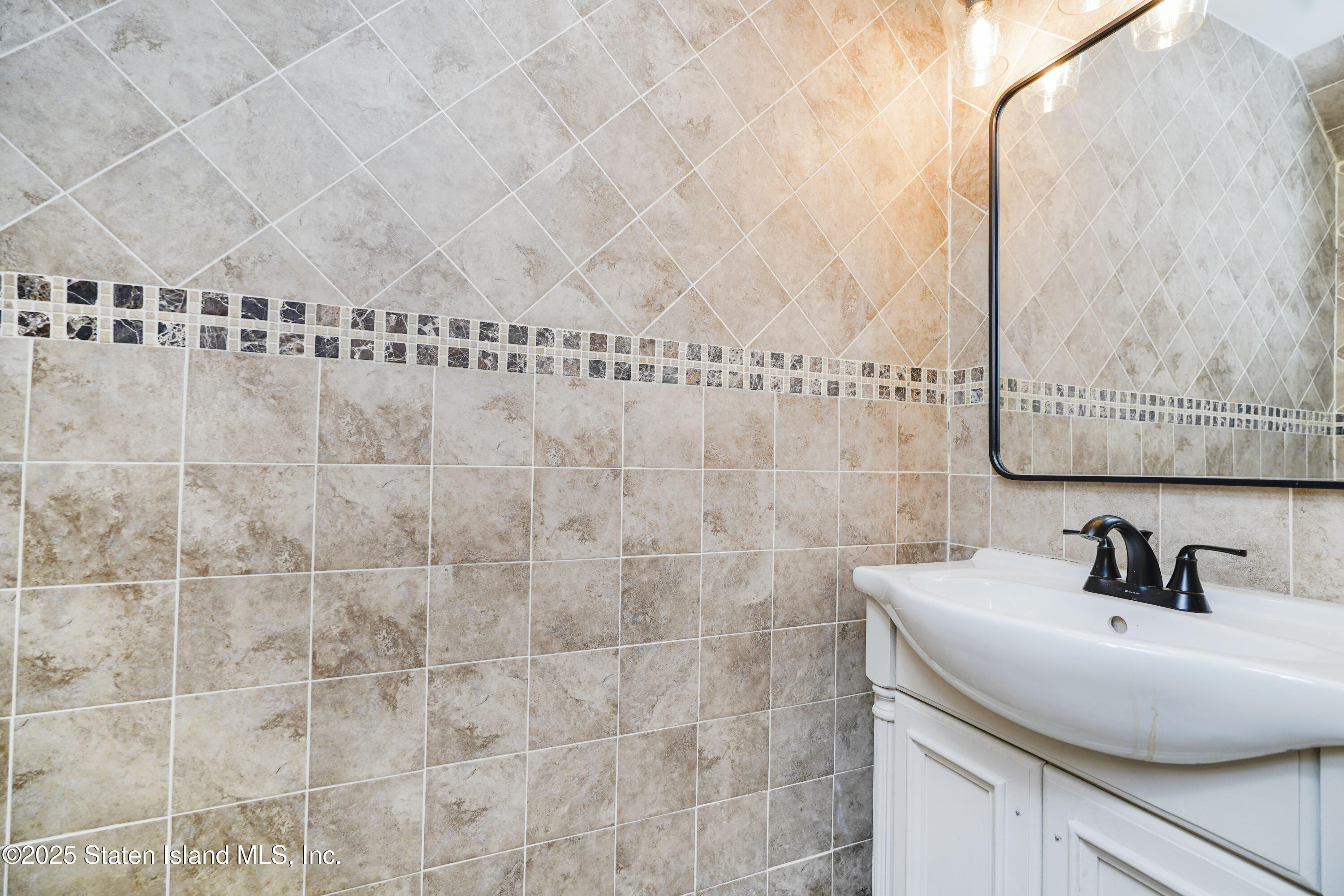 8 Mc Divitt Avenue, Unit A Staten Island, NY 10314 - Photo 12 of 30 half bath first floor