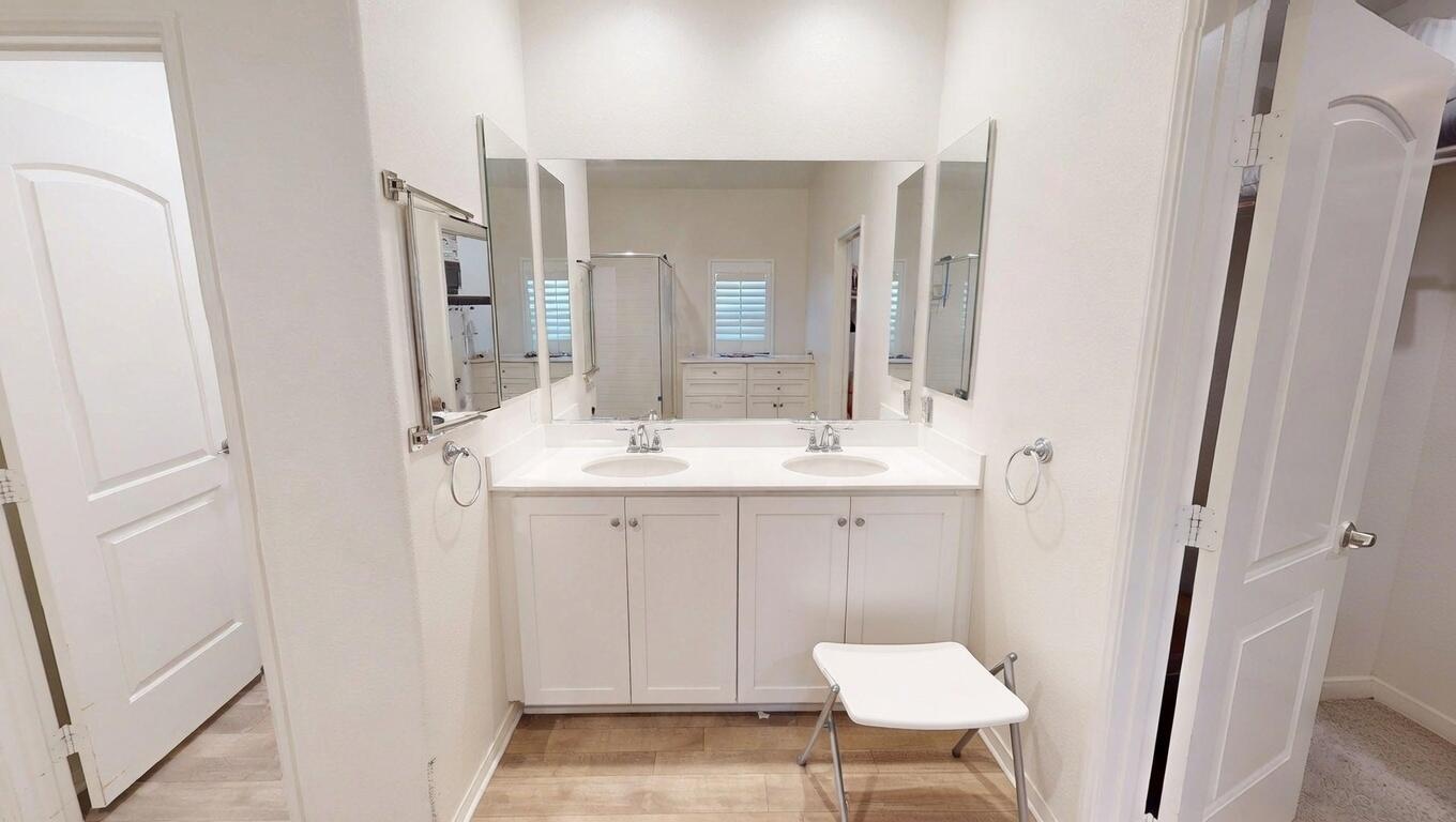 44748 Domaine Way Indio, CA 92203 - Photo 27 of 46 AI Clutter removed primary bathroom