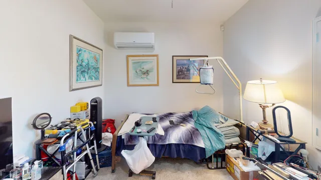 a bathroom with a sink toilet and a mirror