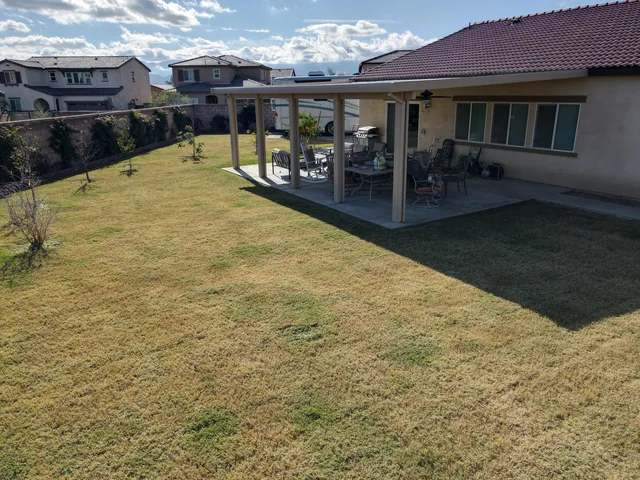 a view of a patio with swimming pool