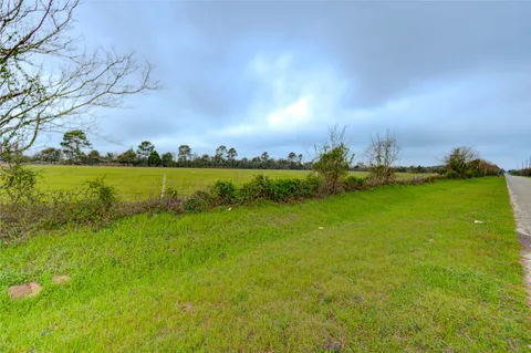 a view of a golf course with a garden