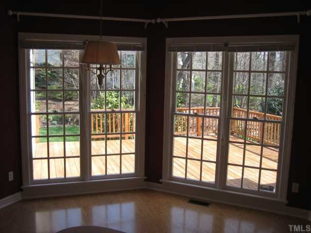7928 Rooksley Court Raleigh, NC 27615 - Photo 5 of 12 Enjoy your morning coffee or tea with a view of nature, or stroll onto your spacious deck. Breakfast Area