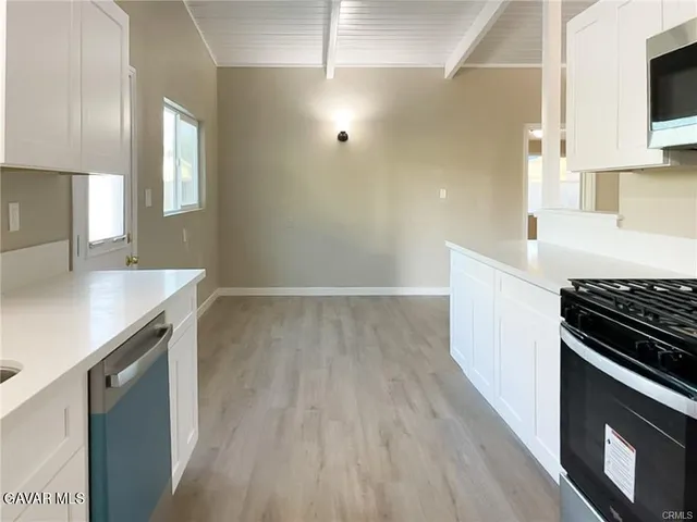 an empty room that has a window