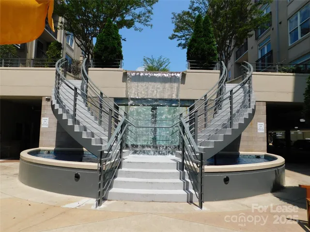 a view of fountain in front of building