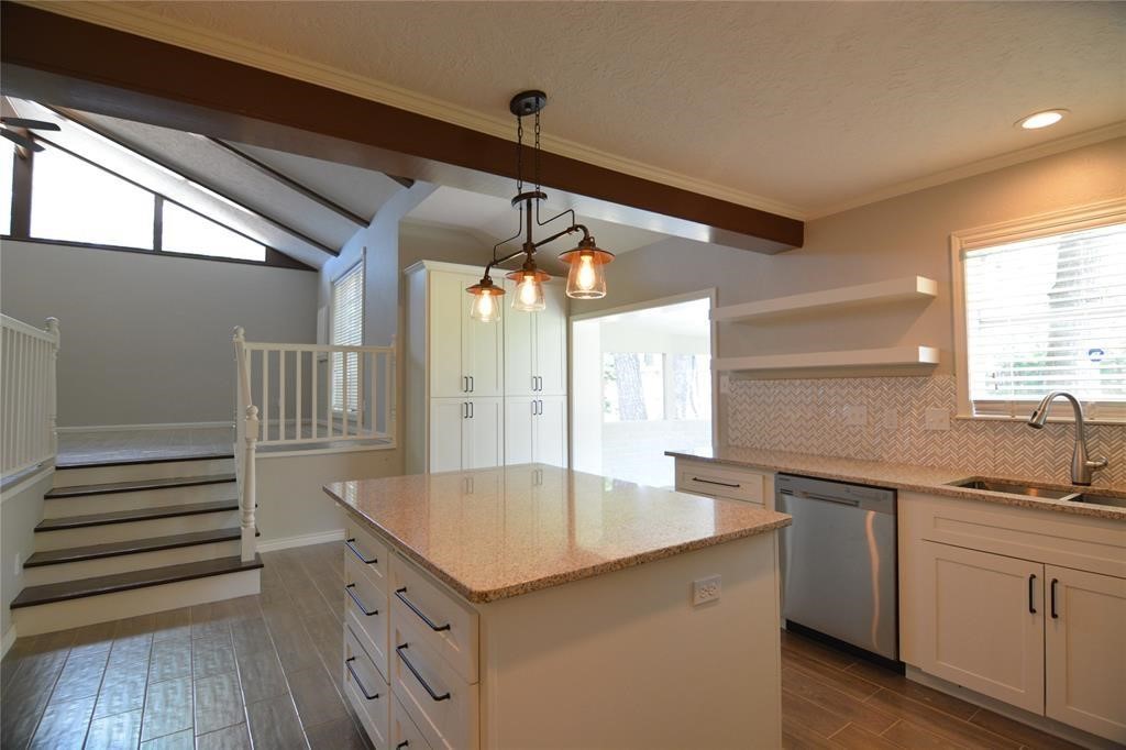19118 Challe Circle West Spring, TX 77373 - Photo 5 of 21 a kitchen with a sink and cabinets