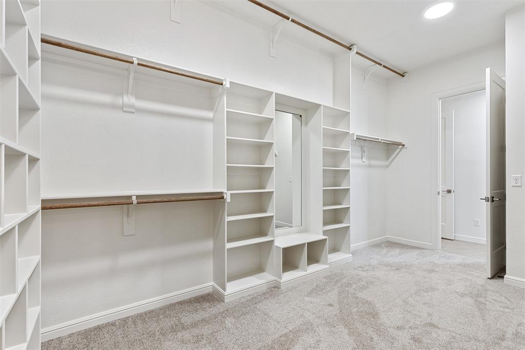 151 Ava Rose Lane Waxahachie, TX 75167 - Photo 21 of 32 a view of an empty walk in closet