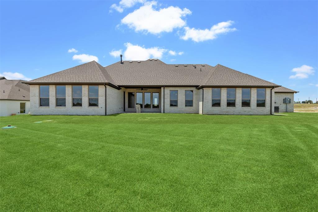 151 Ava Rose Lane Waxahachie, TX 75167 - Photo 3 of 32 a view of a house with a yard and sitting area