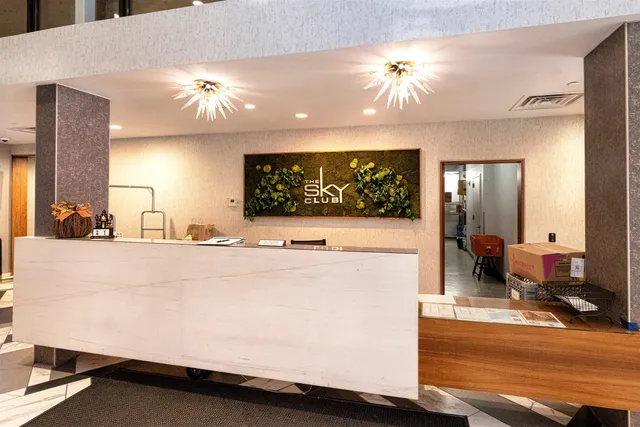 a view of a living room and bathroom