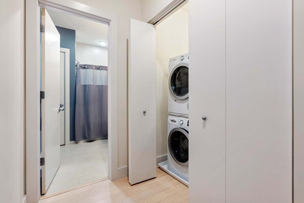 121 Portland Street, Unit 206 Boston, MA 02114 - Photo 24 of 35 a utility room with dryer and washer