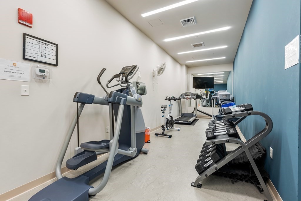 121 Portland Street, Unit 206 Boston, MA 02114 - Photo 27 of 35 a view of a room with gym equipment