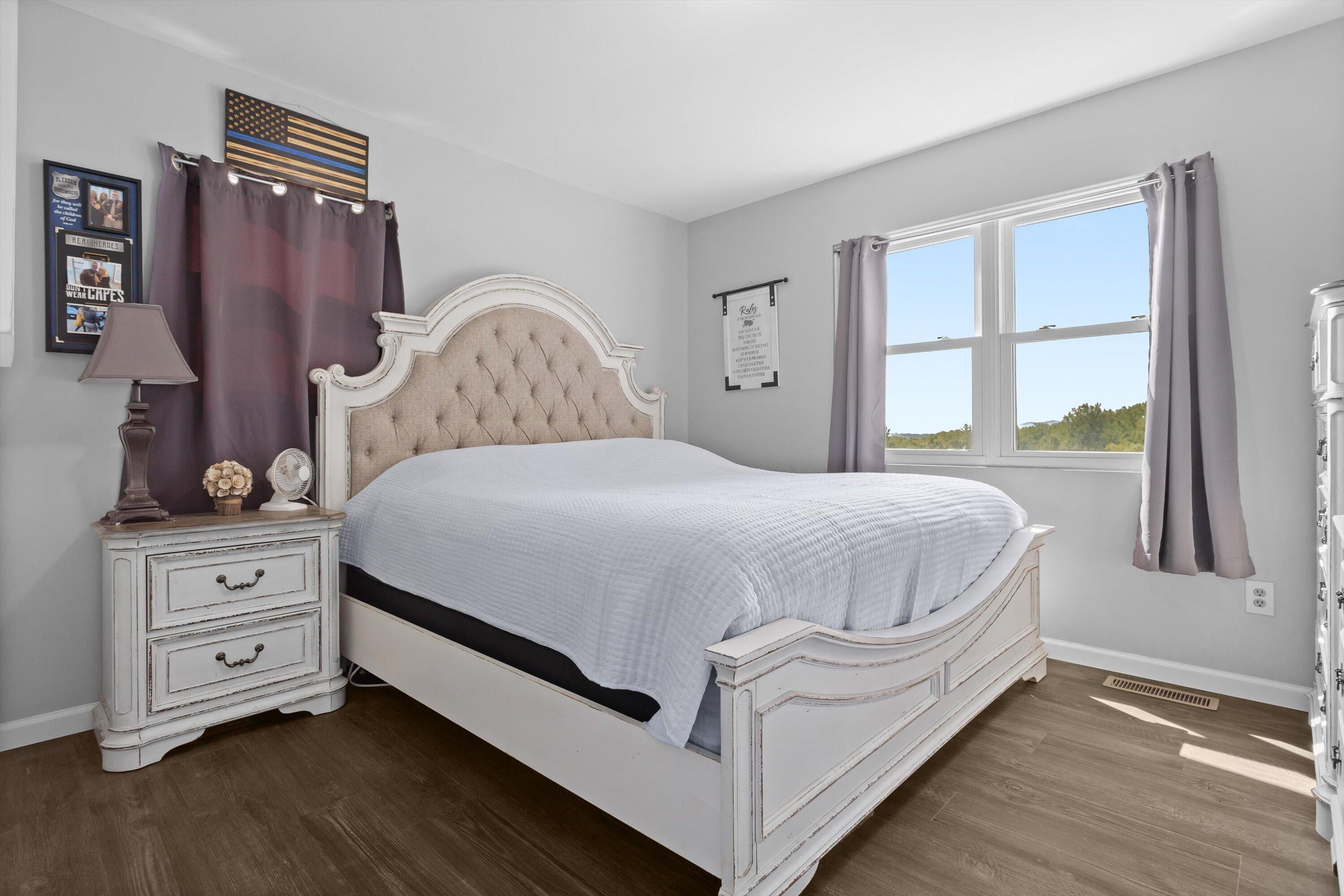 2357 Nemmo Road Vinton, VA 24179 - Photo 23 of 54 a bedroom with a bed and a dresser