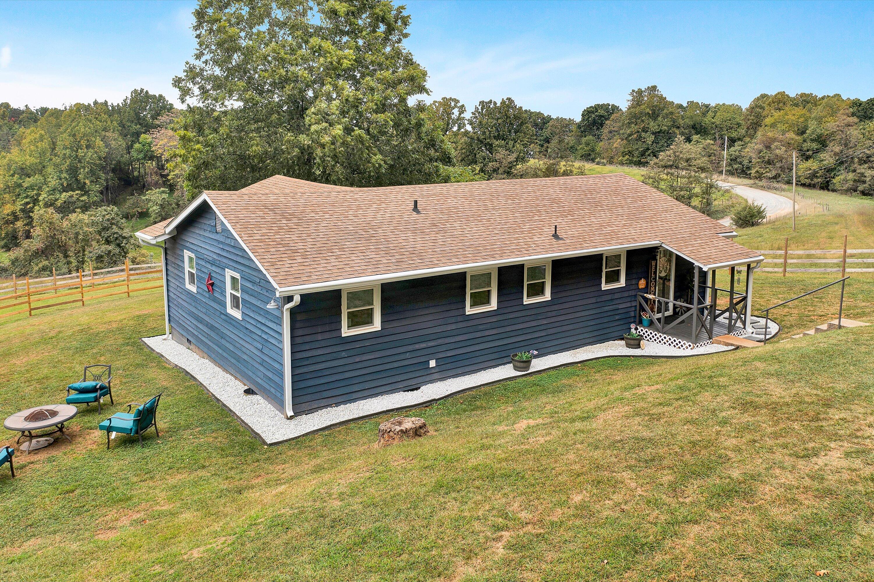 2357 Nemmo Road Vinton, VA 24179 - Photo 30 of 54 a view of a house with pool and a yard