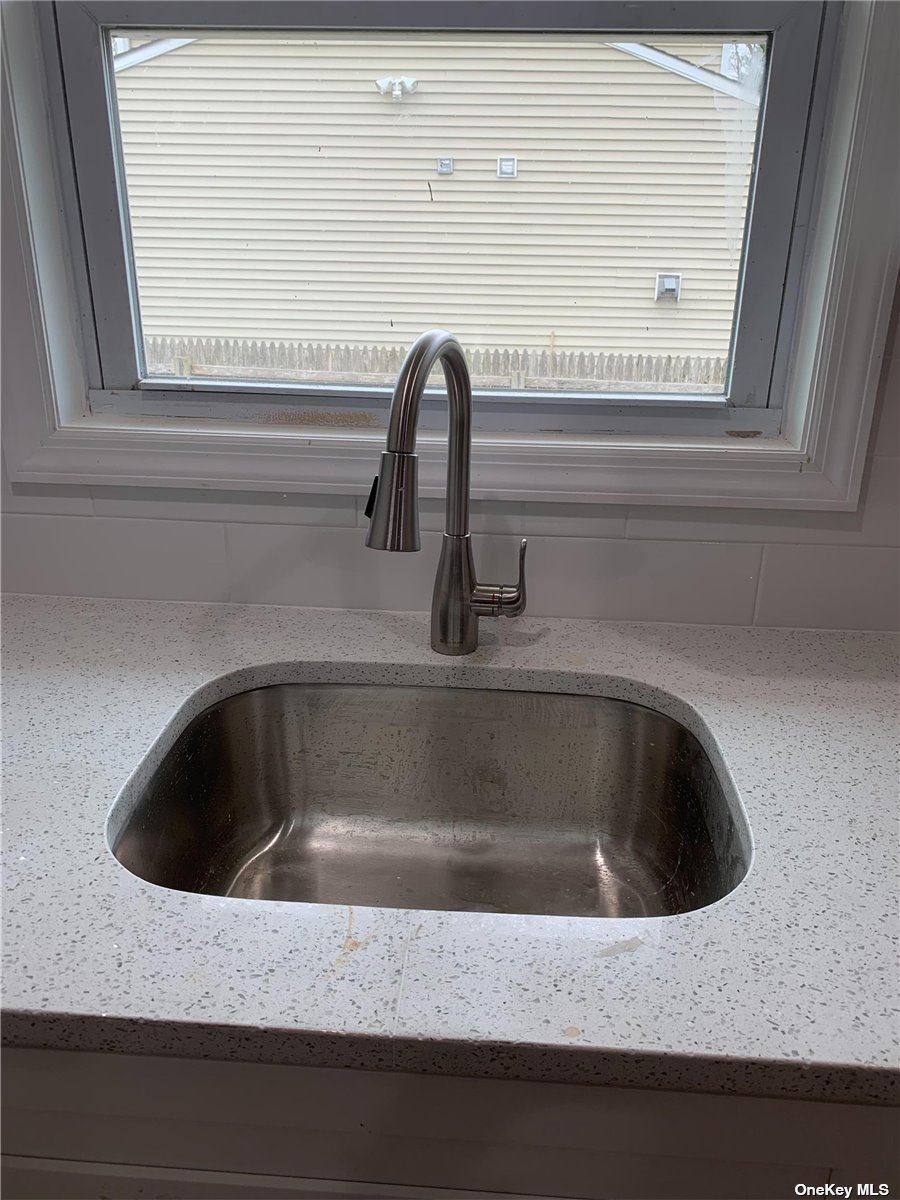 a close view of a sink and tap