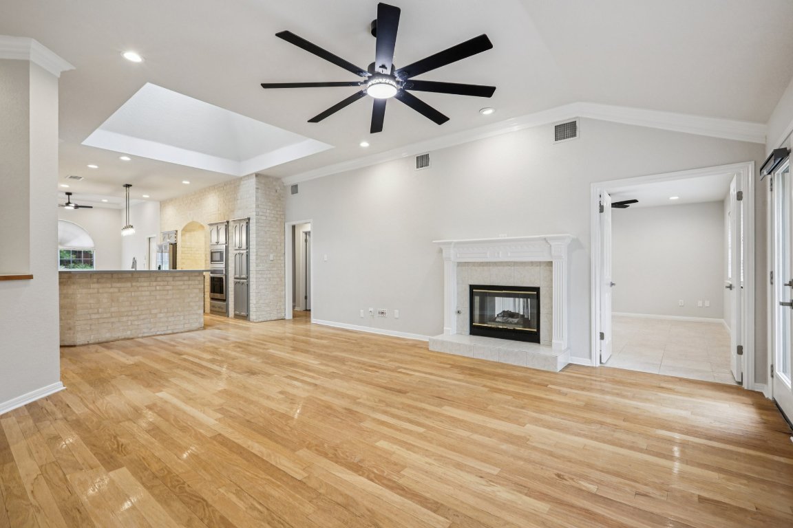 8109 Isaac Pryor Drive Austin, TX 78749 - Photo 11 of 20 a view of an empty room with a fireplace