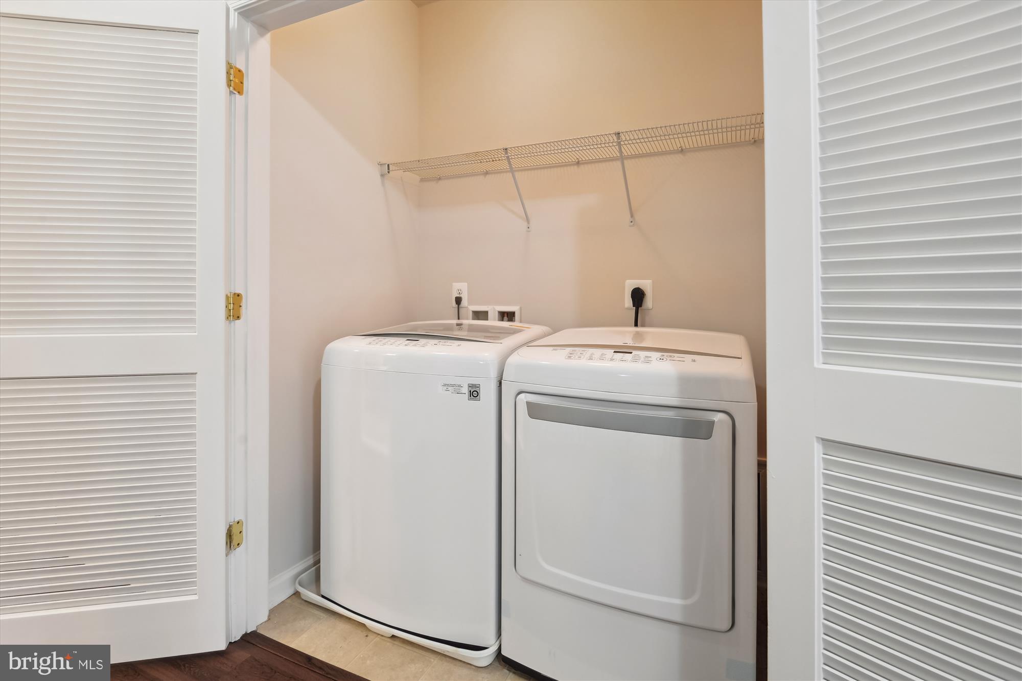 22678 Verde Gate Terrace Brambleton, VA 20148 - Photo 21 of 39 a utility room with dryer and washer