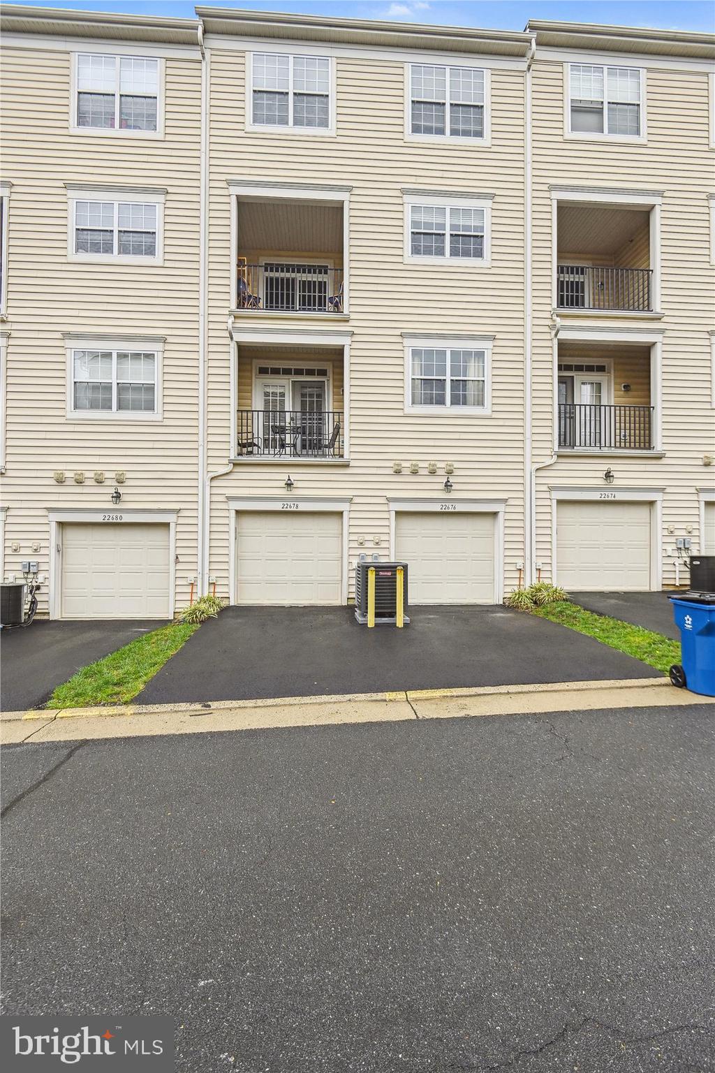 22678 Verde Gate Terrace Brambleton, VA 20148 - Photo 3 of 39 a view of building with a street