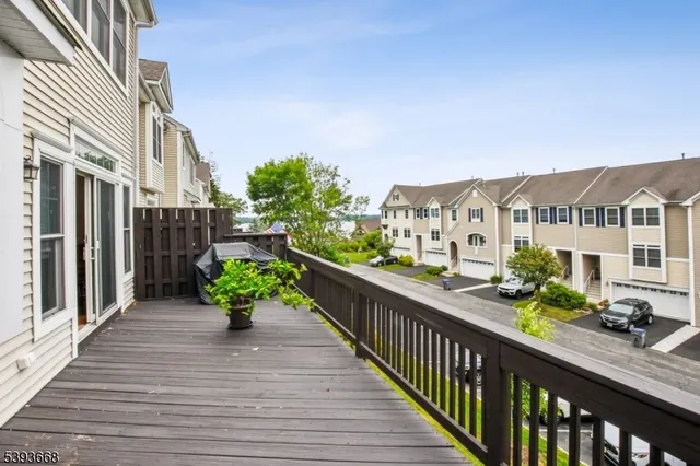 a view of a balcony with chairs