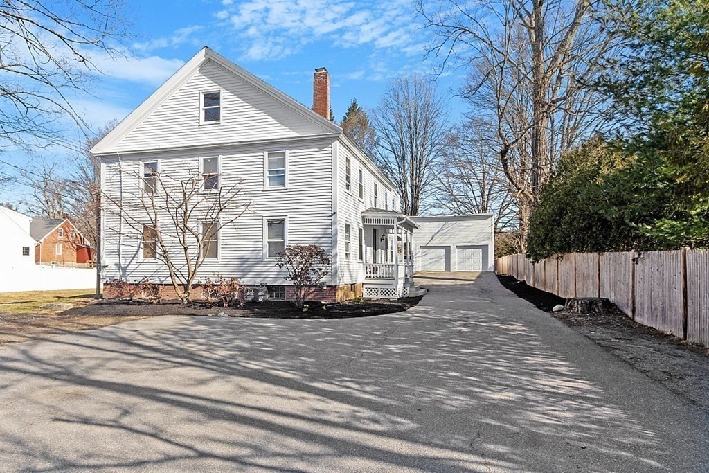 8 Main Street, Unit 2R Pepperell, MA 01463 - Photo 13 of 13 a view of a house with a yard