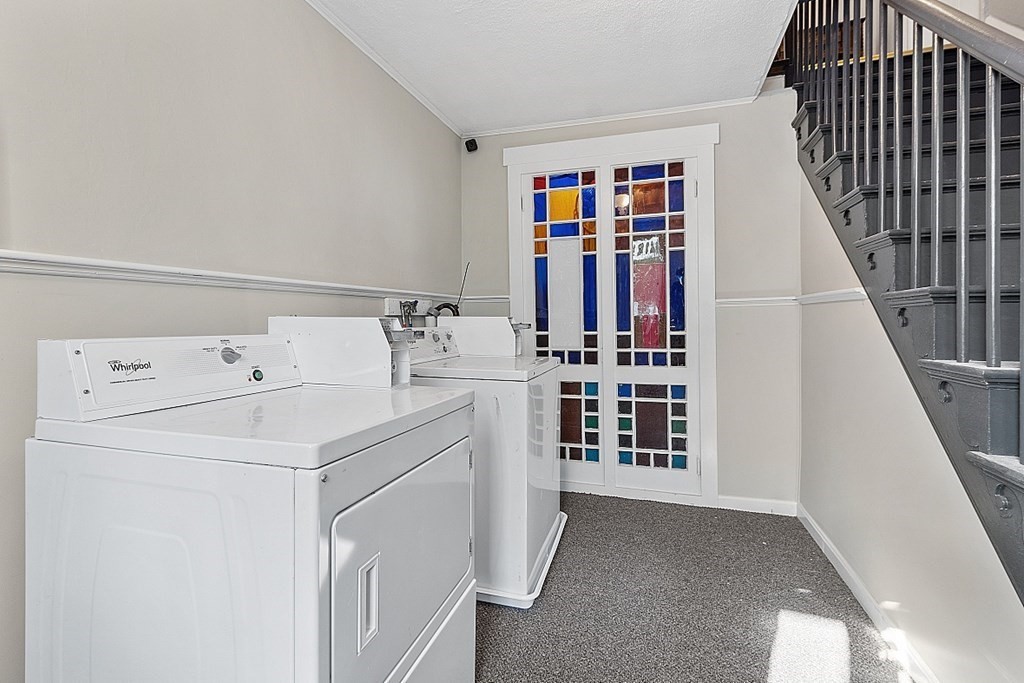 8 Main Street, Unit 2R Pepperell, MA 01463 - Photo 3 of 13 a utility room with dryer and washer