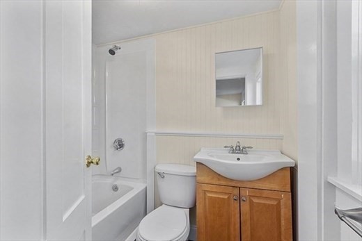 8 Main Street, Unit 2R Pepperell, MA 01463 - Photo 6 of 13 a bathroom with a sink toilet and shower